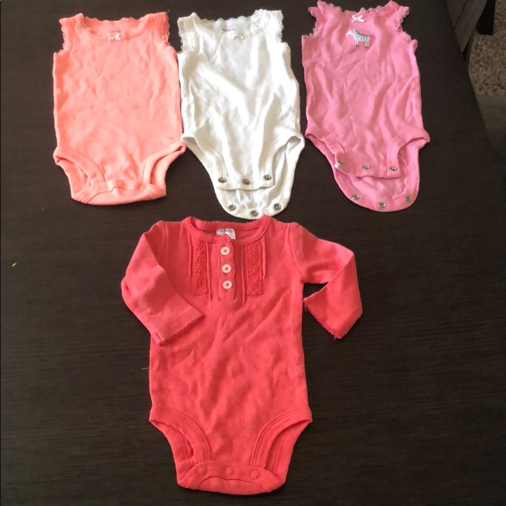 Carters new born body suit 4 piece Used